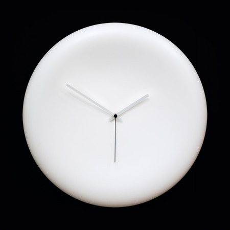 Abstract blank white modern analog clock with arrows on black background. Time concept. Isolated...
