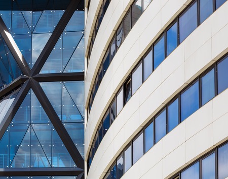 Abstract modern building. Close-up view of the modern building of steel and glass. Modern architecture.の写真素材