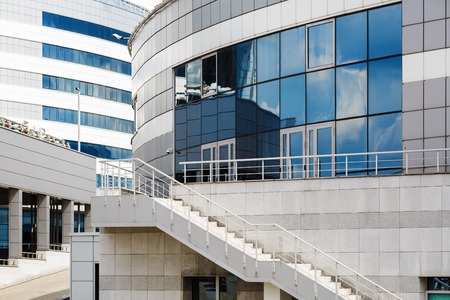 Modern buildings of glass and concrete. Modern business industrial architecture.の写真素材