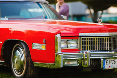 MINSK, BELARUS - MAY 07, 2016: Close-up photo of the red Cadillac Eldorado 1976 model year. Vintage retro car. Selective focus.のeditorial素材