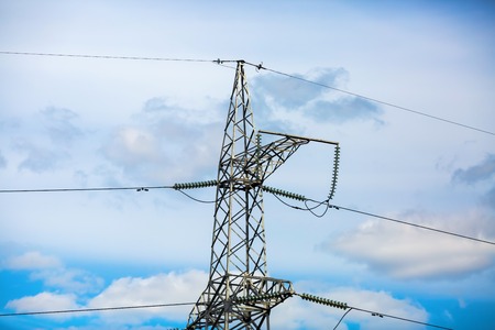 High voltage tower. Electricity pylon with blue sky background.の写真素材