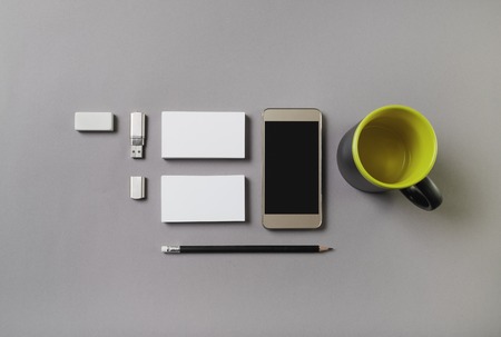 Photo of blank stationery on gray background. Template for placing your design. Mockup for ID. Top...