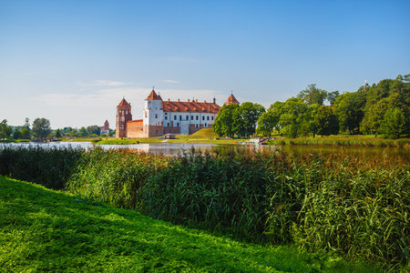 Mir, Belarus - August 11, 2017: Castle on the shore of the lake. Castle in Mir, Belarus - historical heritage of Belarus.のeditorial素材