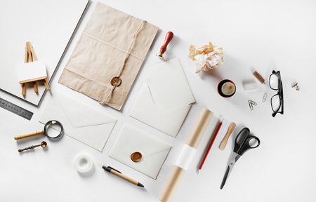 Blank retro stationery set on paper background. Flat lay.の写真素材