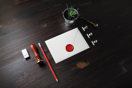 Vintage stationery set on wood table background. Responsive design mockup.の写真素材