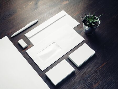 Photo of blank stationery set on wooden background. Business brand template. Branding mock up.の写真素材