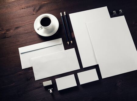 Corporate identity template. Photo of blank stationery set on wooden background.の写真素材