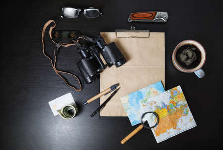 Travel plan background. Ready for the trip. Essential travel accessories on black table background. Flat lay.の素材 [FY310151203451]