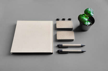 Blank kraft stationery template on gray paper background. Mock-up for branding identity. For design...