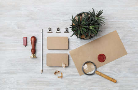 Kraft stationery mock up. Blank corporate identity set on light wooden background. Template for branding identity. Flat lay.の写真素材