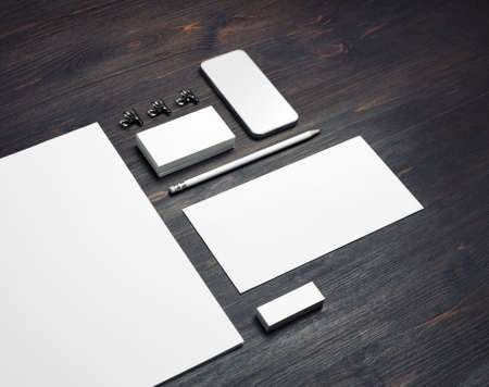 Blank stationery set on wood table background. Template for branding identity. For graphic designers presentations and portfolios.の写真素材