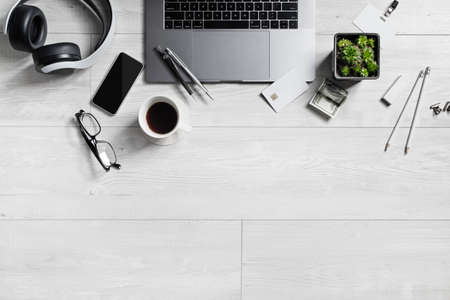 Workspace with office supplies and gadgets. Copy space for your text. Flat lay.