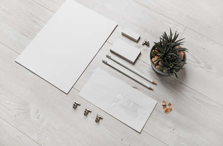 Photo of blank stationery set on wooden background. Business brand template. Branding mock up.の写真素材
