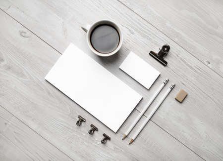 Blank business stationery set on light wooden background. Branding mockup. flat lay.の写真素材
