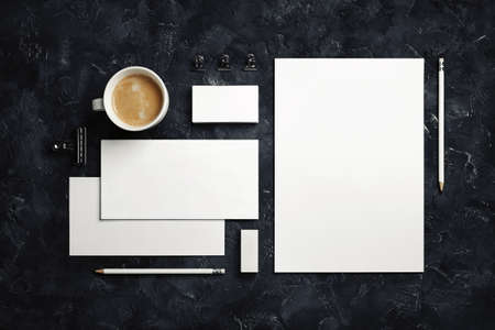 Photo of blank corporate stationery set on black plaster background. Template for branding design. top view. flat lay.の写真素材