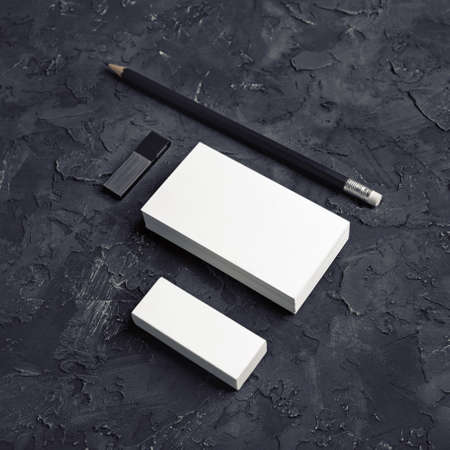 Photo of business cards, pencil, eraser and usb flash drive. Branding mockup.の写真素材