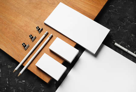 Branding stationery mockup and wooden board. Blank objects for placing your design.の写真素材