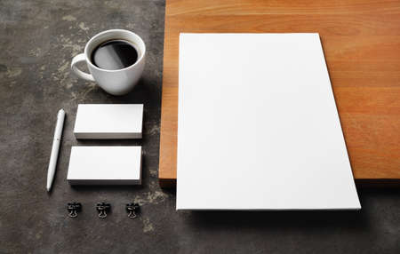 corporate identity template. Blank letterhead, business cards, pen, coffee cup and clips.の写真素材