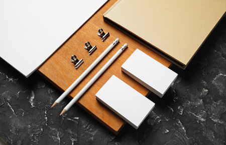 Blank business stationery set. Corporate identity template and wooden board.の写真素材