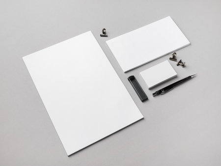 Blank branding stationery set on gray paper background. Responsive design template.の写真素材