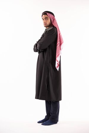 Portrait of an Arab man in kufiya and national dress. Isolated on white background.の写真素材