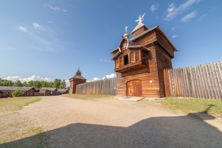 Wooden houses in the street in village. A museum of wooden architecture of Taltsy.の写真素材