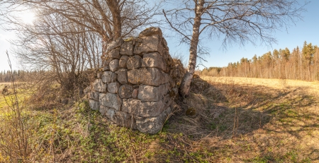 Ruins of the old stone house which have grassed and a moss. Springの写真素材