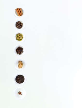Ingredients for Indian masala tea on gray backgroundの写真素材