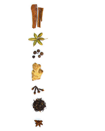 Ingredients for Indian masala tea on white backgroundの写真素材
