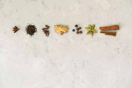 Ingredients for Indian masala tea on white backgroundの写真素材