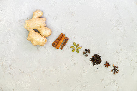 Ingredients for Indian masala tea on white backgroundの写真素材