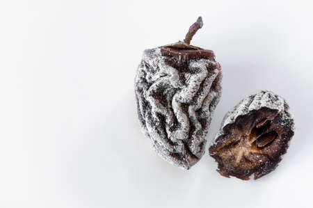 Dried persimmon on a white background. Healthy dietの写真素材