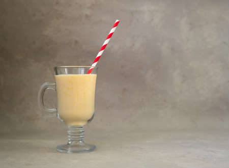Yellow Indian mango yoghurt drink Mango Lassi or smoothie with turmeric and saffron. Healthy probiotic Indian cold summer drink.. High quality photoの写真素材