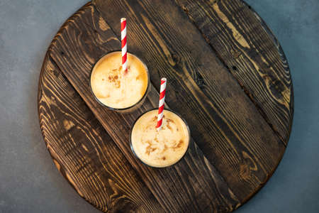 Yellow Indian mango yoghurt drink Mango Lassi or smoothie with turmeric and saffron. Healthy...
