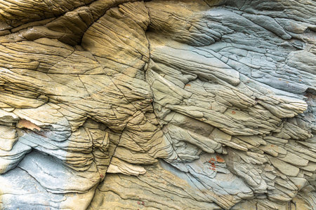 The rocks are colorful rock formations that have been deposited over hundreds of years. background and texture. high quality photoの写真素材