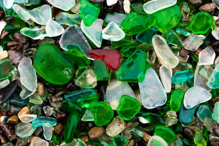 Glass Bay in Vladivostok. Sea-polished colored glass on the beach. Background, texture. high quality photoの写真素材
