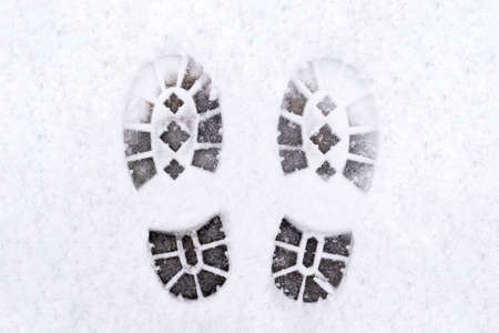 trail of shoes in the snow, tread in the snow. high quality photoの写真素材