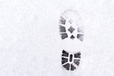 trail of shoes in the snow, tread in the snow. high quality photoの写真素材