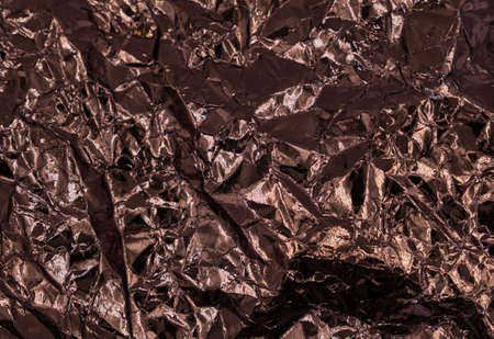 Abstract texture pattern metallic paper using as a background or wallpaper. Metal aluminum foil shiny and reflector. high quality photoの写真素材