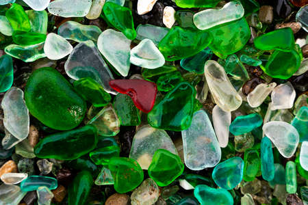 Glass Bay in Vladivostok. Sea-polished colored glass on the beach. Background, texture. high quality photoの写真素材