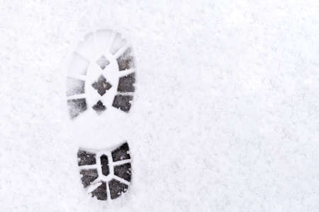 trail of shoes in the snow, tread in the snow. high quality photoの写真素材