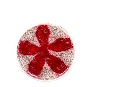 Pink jelly body scrub with strawberry scent on a white background. high quality photoの写真素材