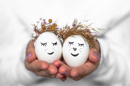 Easter eggs with happy faces. Close up, isolated. happy easter. high quality photoの写真素材