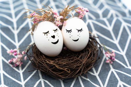 Easter eggs with happy faces. Close up, isolated. happy easter. high quality photoの写真素材