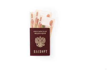 Russian passport with banknotes of 5000 rubles on a white background. high quality photo