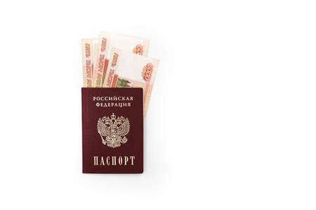 Russian passport with banknotes of 5000 rubles on a white background. high quality photoの写真素材