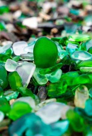 Glass Bay in Vladivostok. Sea-polished colored glass on the beach. Background, texture. high quality photoの写真素材