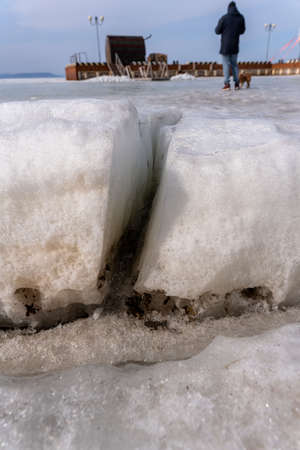 crack in the ice sheet. snow ice. Cracked ice floats on the sea. high quality photoの写真素材