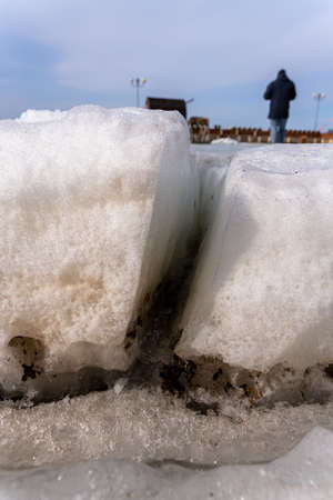 crack in the ice sheet. snow ice. Cracked ice floats on the sea. high quality photoの写真素材
