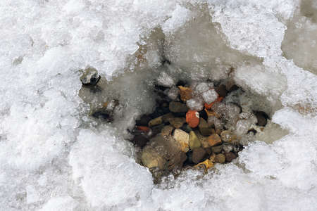 crack in the ice sheet. snow ice. Cracked ice floats on the sea. high quality photoの写真素材